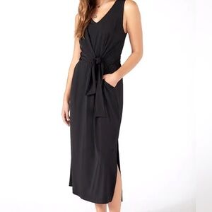 Karen Kane black midi travel dress. Poly/Spandex. Pockets. Side Slit. Size S.NWT
